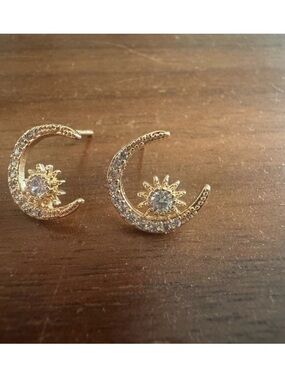 Celestial sun and moon earrings in gold toned 925 silver with rhinestones